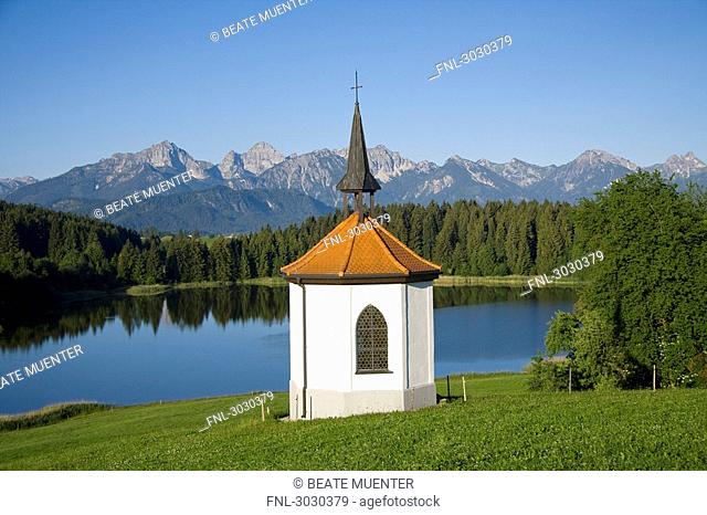 Chapel at the lake of Hegratsried near Halblech, Allgau, Germany