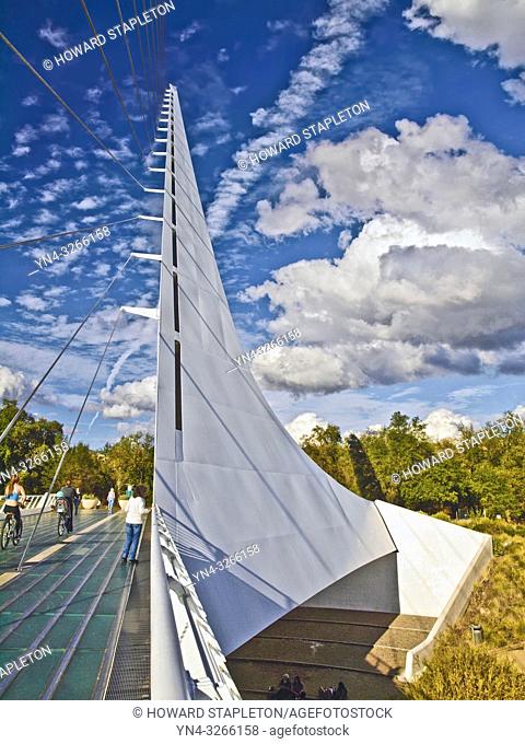 Sundial Bridge in Redding, California. This 710 foot span crosses the Sacramento River, and forms a working sundial. The glass decked bridge is used only for...