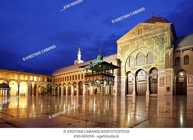 Empty courtyard of Omayyaden Mosque in the late evening with light and dark blue sky, Damascus, Syria, Middle East, Asia