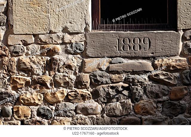 Vignola, Italy: old date on the Rocca’s castle wall