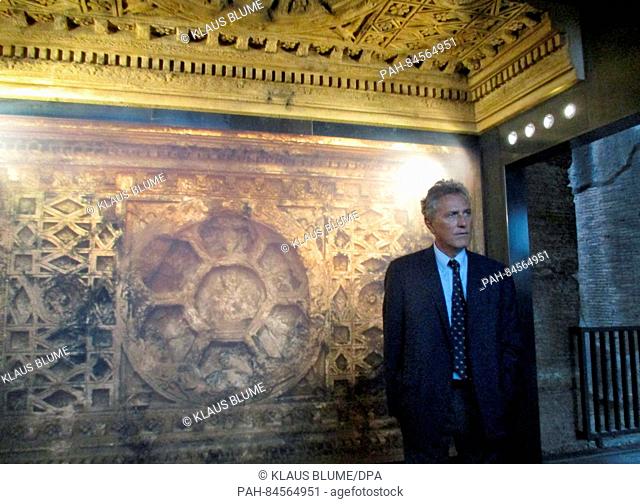 Francesco Rutelli, Italy's former Minister of Cultural Affairs and former mayor of Rome, seen in front of a partial replica of a 2