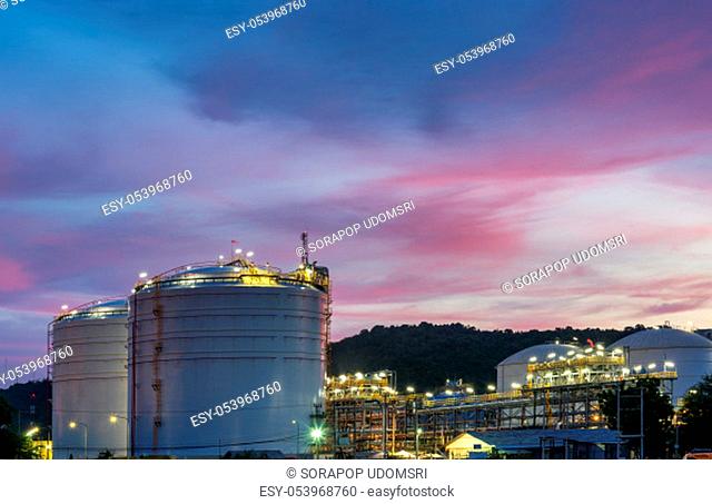 Oil petrochemical refinery plant at sunset twilight