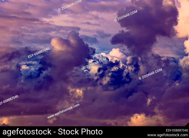 Gorgeous dramatic sunset sky with pink and purple clouds. Abstract nature background
