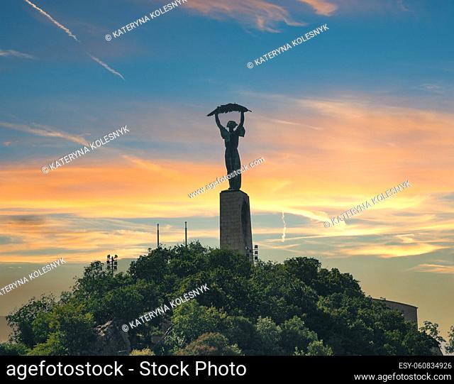 Liberty statue in Budapest on Gellert Hill at sunset