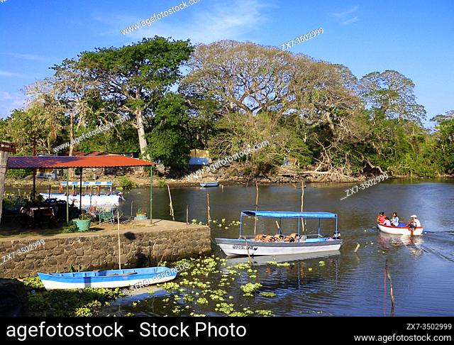 Isletas de Granada, islands in Lake Nicaragua with private home and boaters . Central America. The islands range from a few feet across up to more than an acre;...