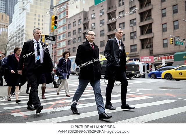 28 March 2018, US, New York: German Foreign Minister of the Social Democratic Party (SPD, 2R), Haiko Mass, walking through Manhattan after the UN Security...