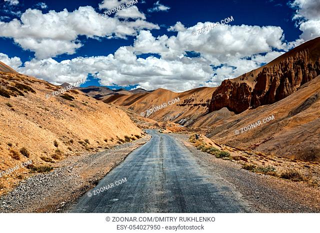 Travel forward adventure background - Trans-Himalayan Manali-Leh highway road in Himalayas. Ladakh, Jammu and Kashmir, India