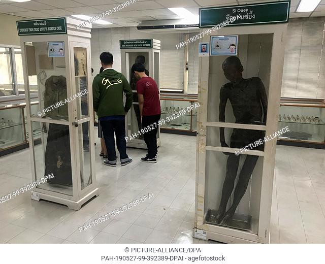 23 May 2019, Thailand, Bangkok: In the museum of the Siriraj Hospital in Thailand's capital Bangkok, the embalmed bodies of murderers are displayed in showcases
