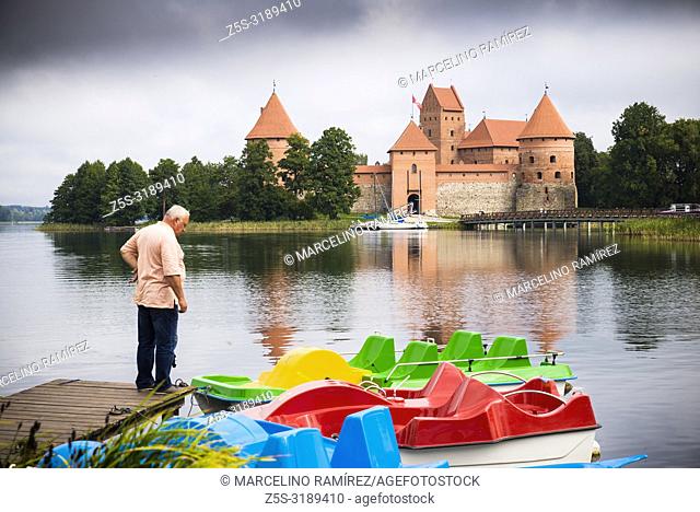 Boats for tourists in front of the Trakai Island Castle. Trakai, Vilnius County, Lithuania, Baltic states, Europe