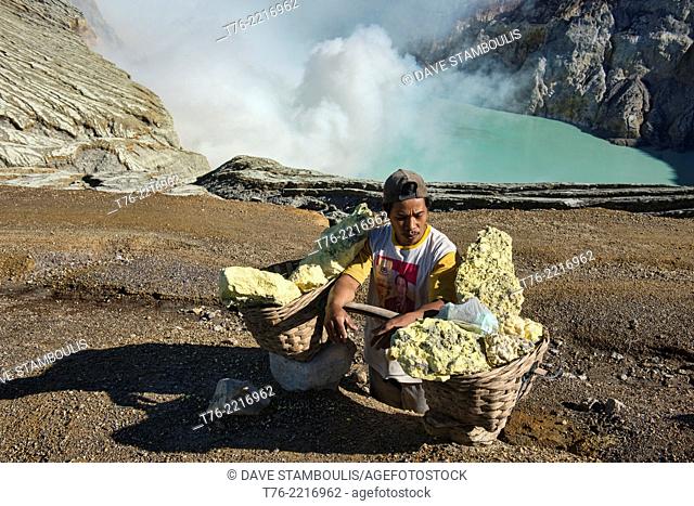 portrait of a sulphur miner in the Kawah Ijen volcanic crater, Java, Indonesia