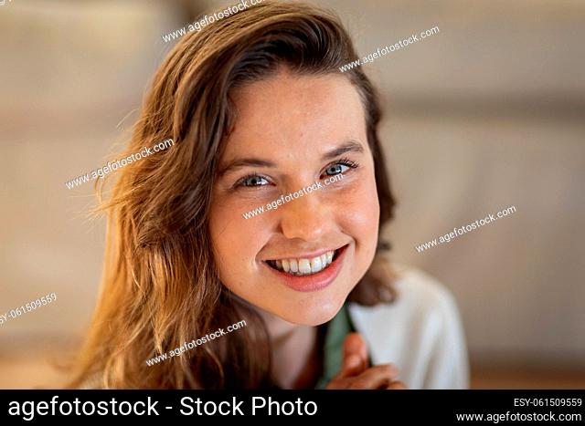 Portrait of woman smiling at home