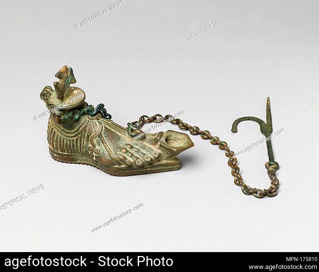 Hanging Lamp in the Form of a Sandaled Right Foot. Date: 5th century; Geography: Made in possibly Syria; Culture: Byzantine; Medium: Copper alloy; Dimensions:...