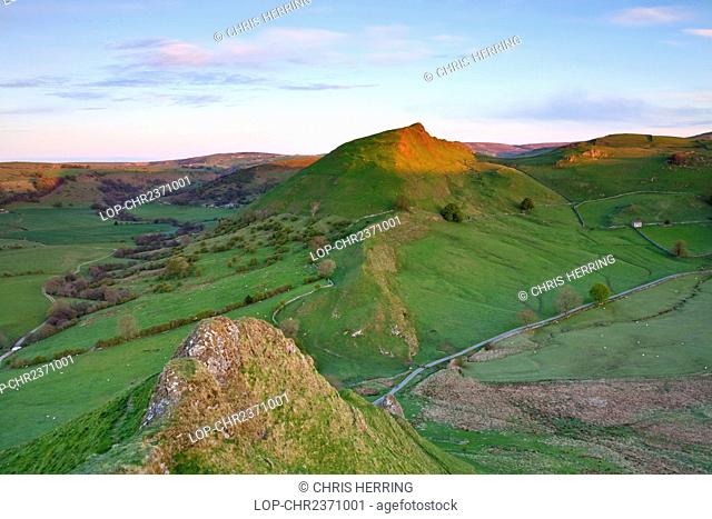 England, Derbyshire, Parkhouse Hill. Parkhouse the Dragons Back and Chrome Hill at first light in the White Peak area of the Peak District National Park