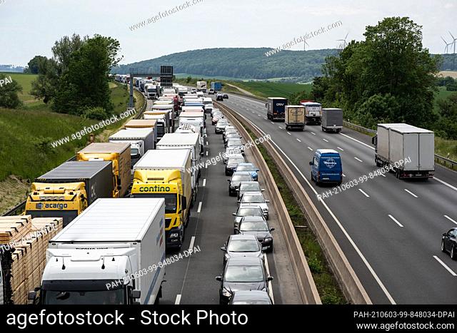 03 June 2021, Lower Saxony, Rhüden: Trucks and cars are jammed between the Rhüden and Bockenem junctions on the northbound A7 motorway