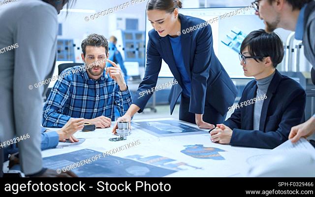 Team of engineers and specialist talking in a meeting