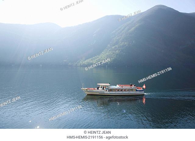Switzerland, Ticino, Lugano, boat along the coast of Lugano Lake by Gandria