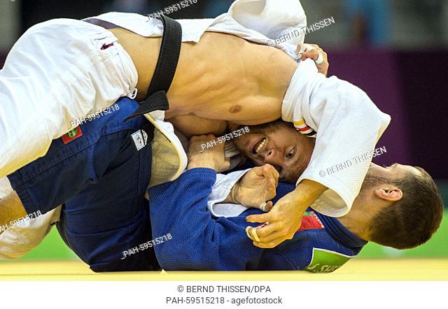 Germanys Sebastian Seidel (white) competes with Dzmitry Shershan of Bulgaria in the Men's -66kg Judo Repechage at the Baku 2015 European Games in Heydar Aliyev...