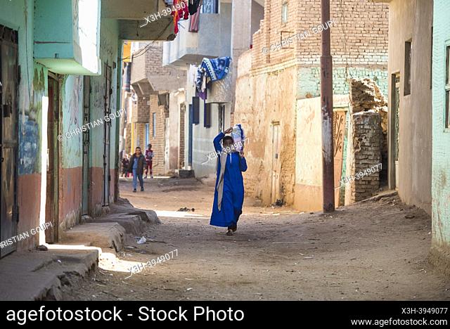 Boy in a street of the village of Ramadi, west bank of the Nile south of Edfu, Egypt, North East Africa