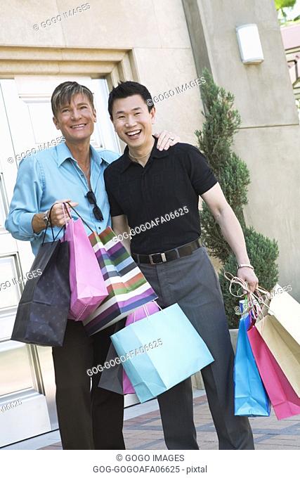 Gay couple window-shopping