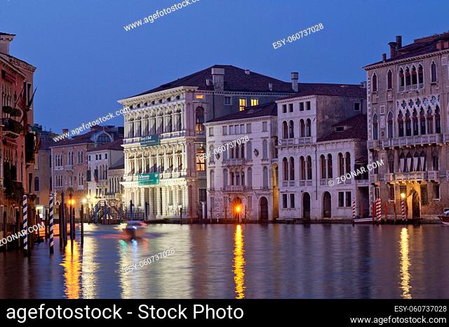 buildings in the light of dawn in the canal grande in venezia