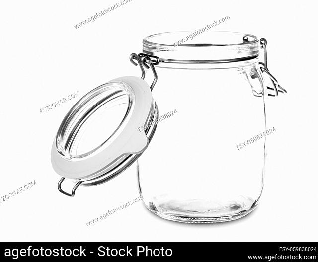 Empty glass jar with the open cap hold with metal wire isolated over the white background