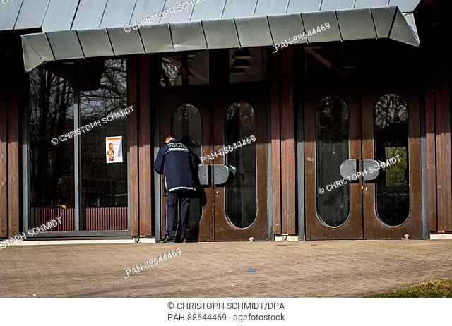 A policeman stands in front of the empty festival hall in Gaggenau, Germany, 2 March 2017. The Turkish Minister of Justice was meant to speak in the hall in the...