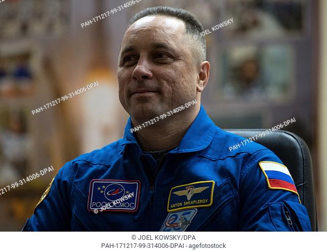 Expedition 54 Soyuz Commander Anton Shkaplerov of Roscosmos is seen in quarantine, behind glass, during a press conference, Saturday, December 16
