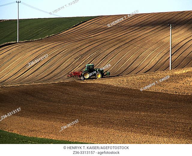 Tractor plowing in Lasser Poland near Slomniki