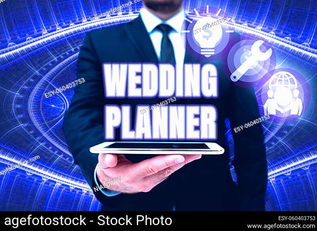 Writing displaying text Wedding Planner, Concept meaning someone who plans and organizes weddings as a profession Man In Office Uniform Holding Tablet...