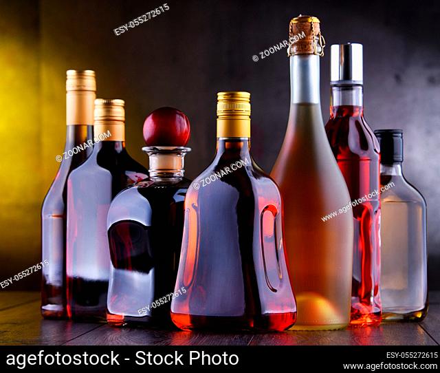 Composition with bottles of assorted alcoholic beverages