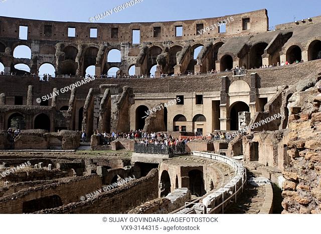 Rome, Italy - October 13, 2017: Tourists from around the world visiting one of ancient wonders, the famous Colosseum of Rome in Italy