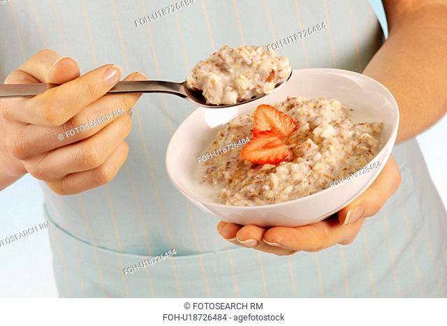 Woman Eating Porridge