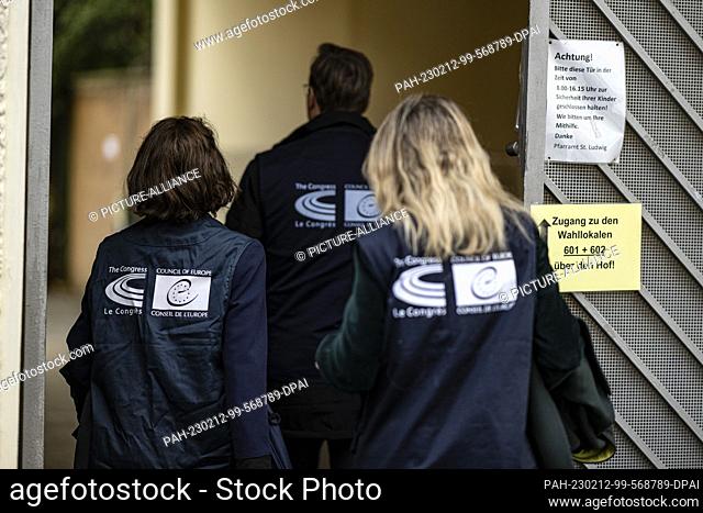 12 February 2023, Berlin: European Council election observers go to a polling station on the day of the repeat election. The election for the 19th House of...