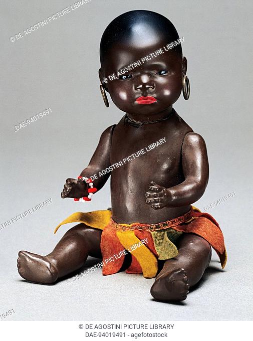 Character black baby doll, toy made by Gebruder Heubach. Germany, 20th century.  Milan, Museo Del Giocattolo E Del Bambino (Toys Museum)