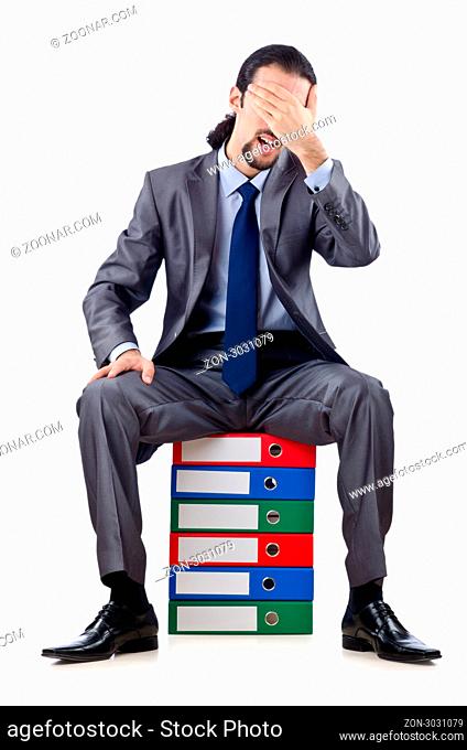 Young businessman with folders on white