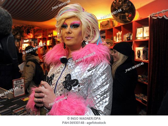 The drag queen Gina Solera guides the participants of her nightly city tour into a sex shop in the red light district of Oldenburg, Germany, 09 February 2013