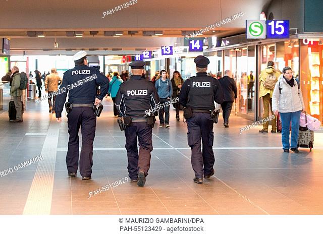 Police patrol through the central station in Berlin, Germany, 17 January 2015. German security services are following up information which amay be hinting at...