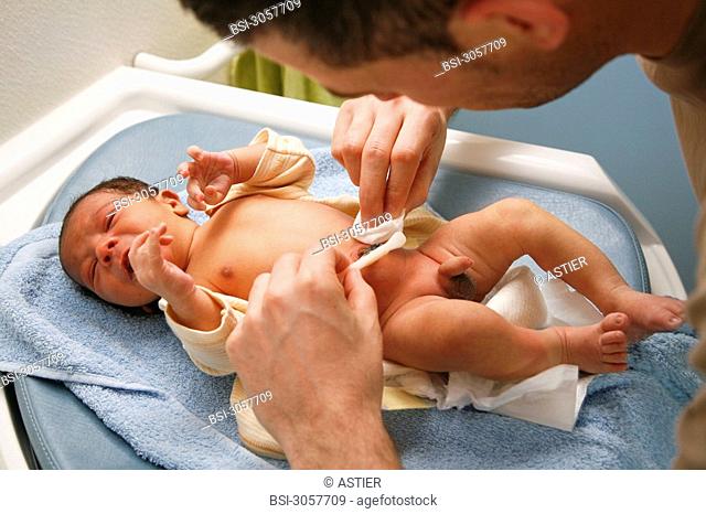 Photo essay at the maternity of Saint-Vincent de Paul hospital, Lille, France. Washing of the newborn baby and cord care