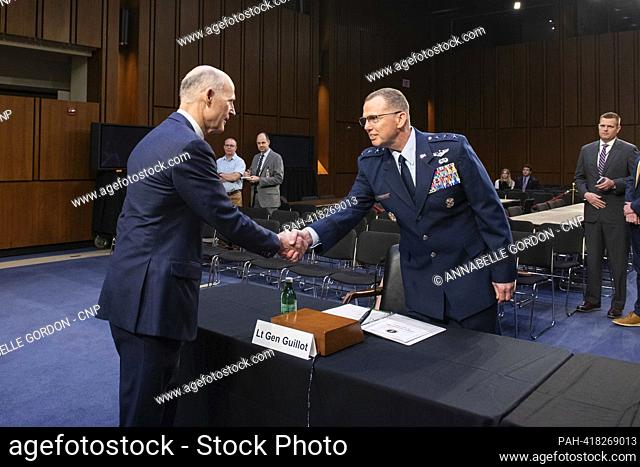United States Senator Rick Scott (Republican of Florida) shakes hands with USAF General Gregory Guillot before Senate Armed Services Hearing to examine the...