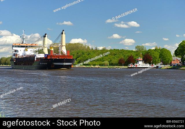 Cargo ship encounters car ferry on Kiel Canal, Schleswig-Holstein, Germany, Europe