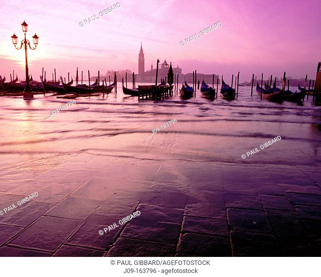 Gondolas and San Giorgio Maggiore island in background. Venice. Italy