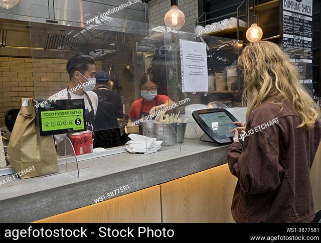 Cafes, bars and restaurants reopened in Spitalfields market food court after closed down due to Covid-19/Coronavirus pandemia, London, England, UK