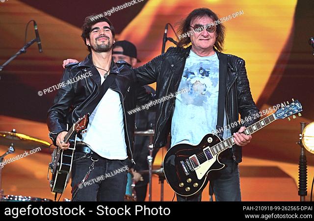 17 September 2021, Saxony, Leipzig: Dieter Maschine Birr (r) and his duet partner Martin Goldenbaum from the band Brenner are on stage during the TV gala...