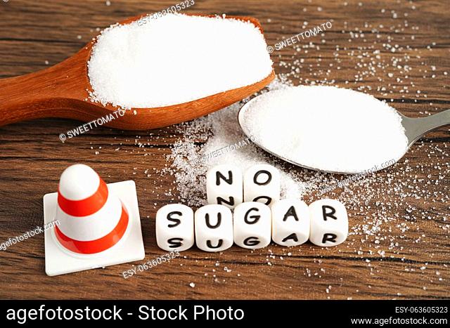 No sugar, sweet granulated sugar with text, diabetes prevention, diet and weight loss for good health