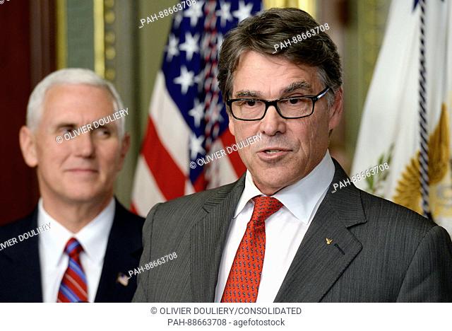 Former Governor Rick Perry (Republican of Texas), right, makes remarks after being sworn-in to be United States Secretary of Energy by US Vice President Mike...