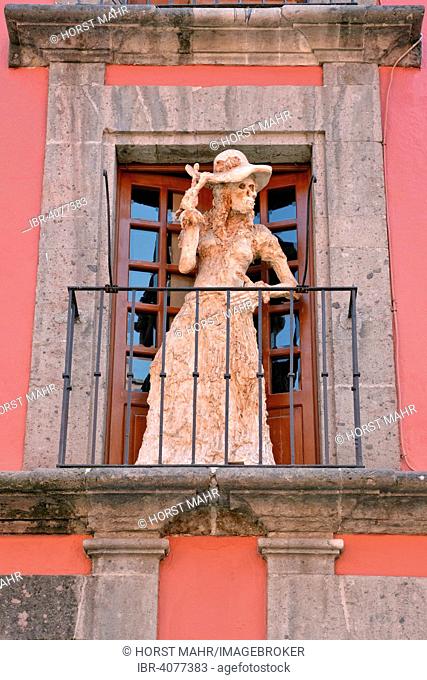 Sculpture on the subject of death and impermanence by Maria Eugenia Chellet, on a balcony of Casa de la Primera Imprenta de America, Mexico City, Mexico