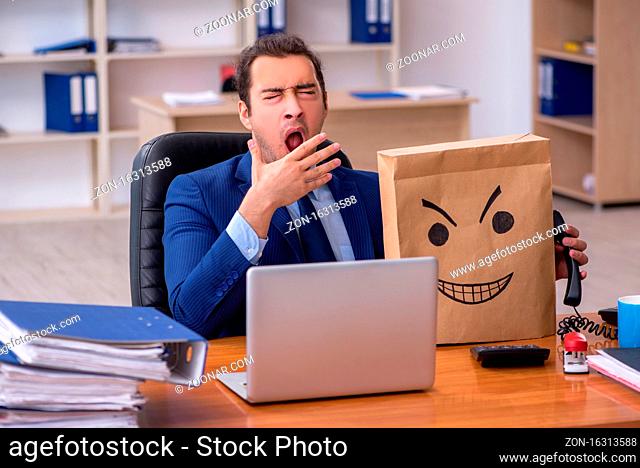 Male employee with box instead of his head