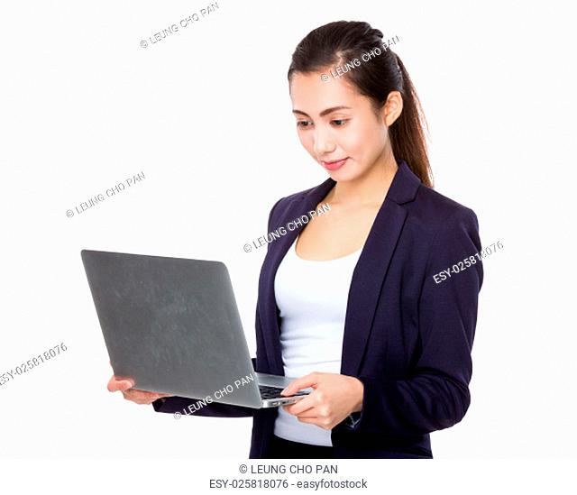 Asian businesswoman use of the laptop computer