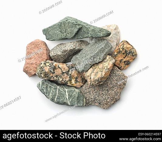 Top view of various crushed stones isolated on white