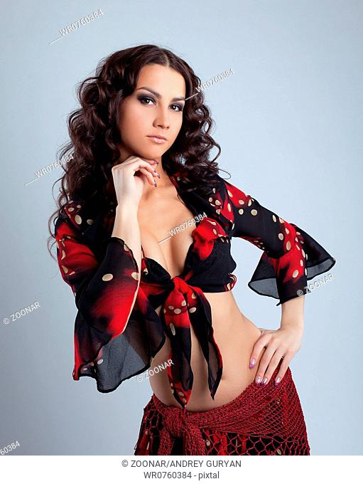 Cute young woman portrait in gypsy costume
